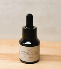 Load image into Gallery viewer, Tulsi & Green Tea Botanical Face Oil by LUX Lifestyle in 1 oz and 0.5 oz bottles